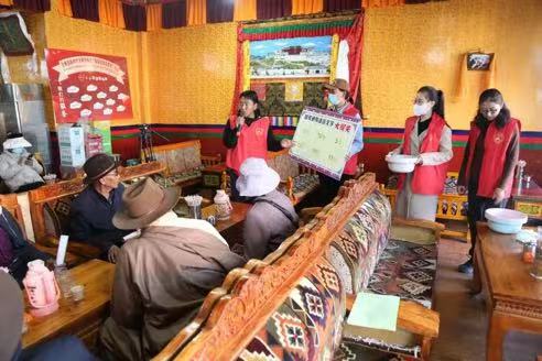 貢嘎縣開展“甜茶館里話黨恩”活動。